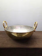 Hand hammered brass kadhai with a grey tin lined interior and two cast ring handles - Peetal Parampara