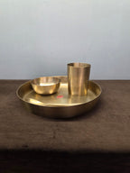 Small kansa baby thali set with a deep straight-walled plate, one katori, a tapered glass and a spoon - Peetal Parampara