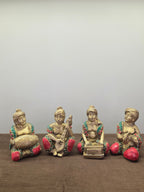 Four seated brass musicians with red and green stone set into the vests, knees and necklaces - Peetal Parampara