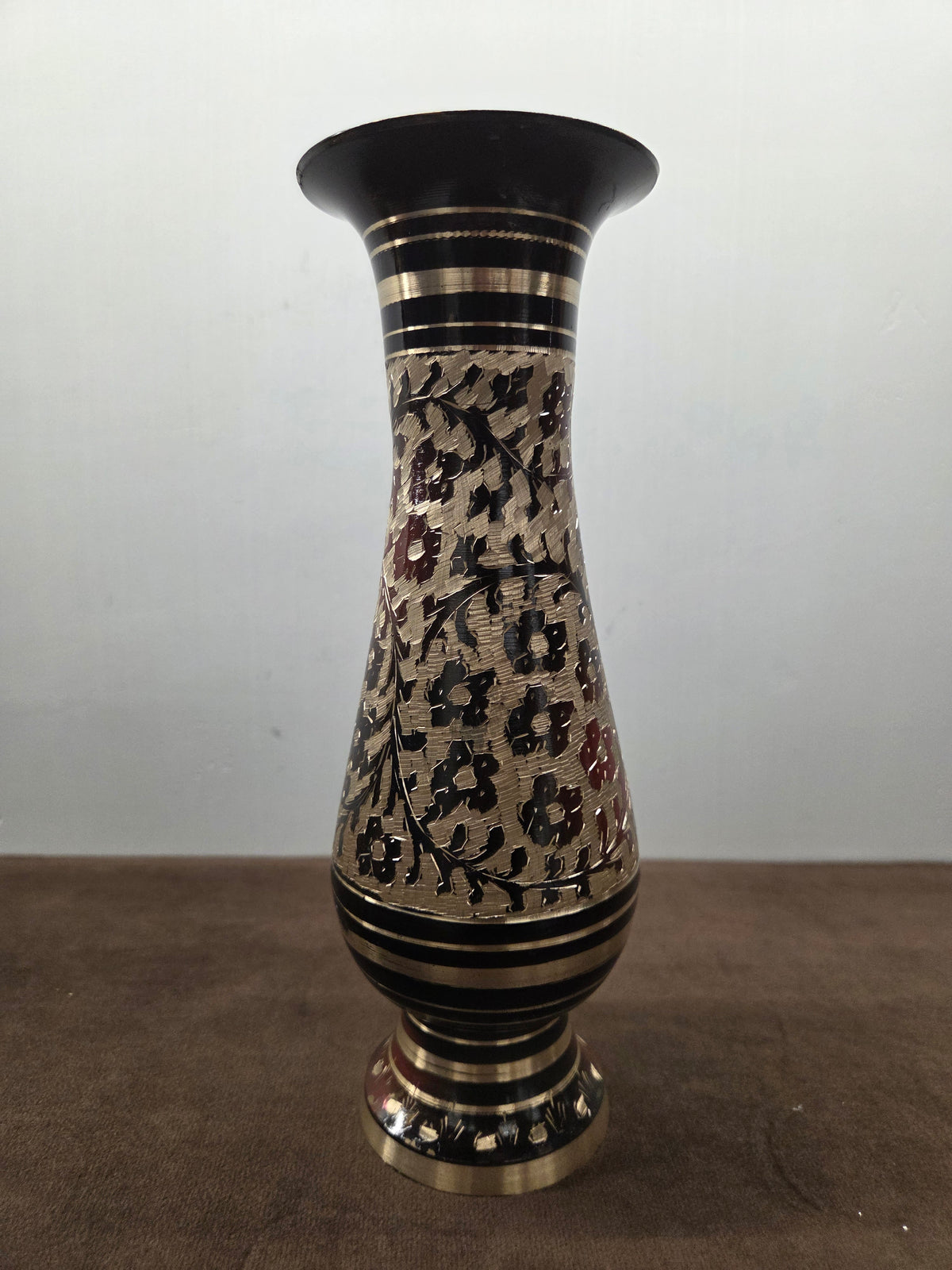 Hand engraved brass vase with a flared trumpet mouth, leaf lines over the belly and turned ring bands - Peetal Parampara