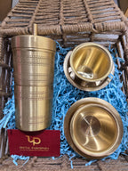 Brass filter coffee pot with a press rod through the lid, two tumblers and two dabara bowls - Peetal Parampara