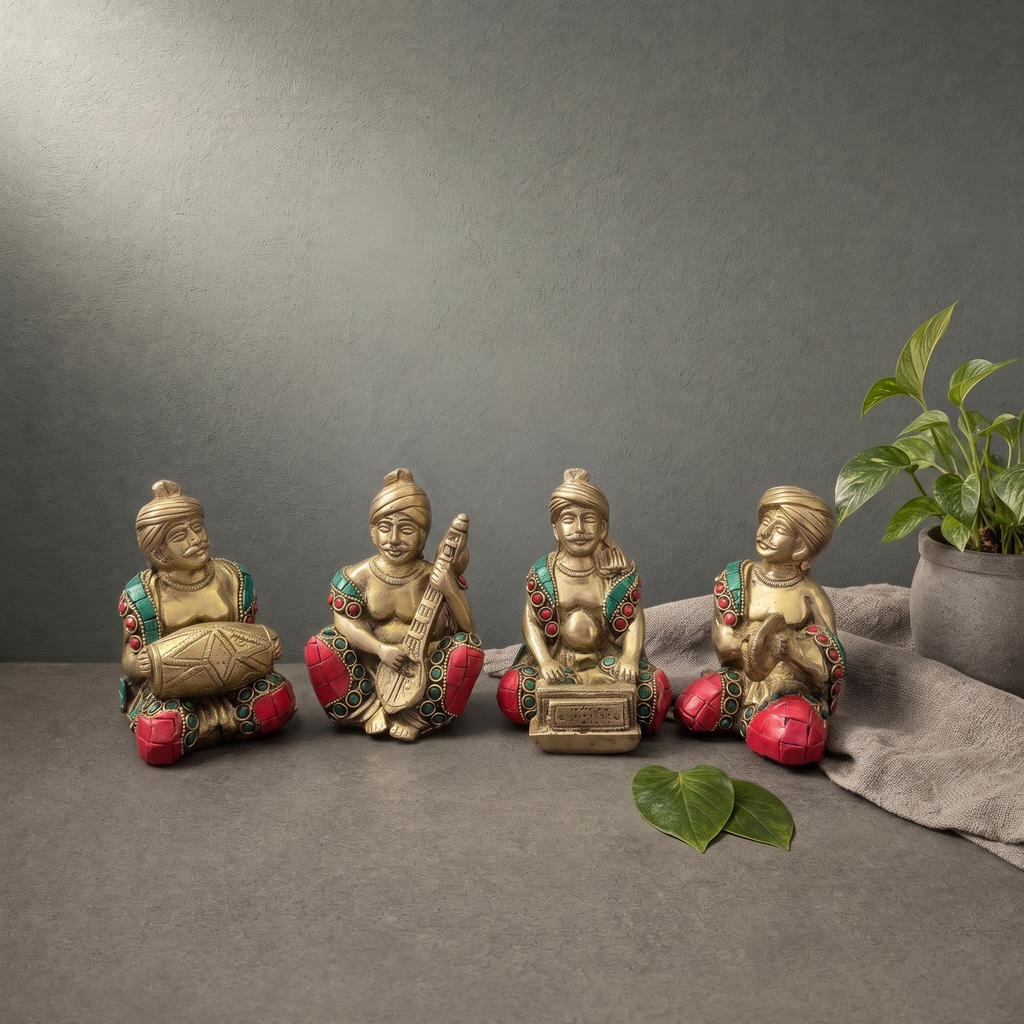 Brass Musicians with Stone Inlay on a stone ledge against a grey plaster wall - Peetal Parampara